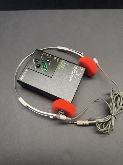 SONY WM-DC2 + SONY MDR 4lS headphones.