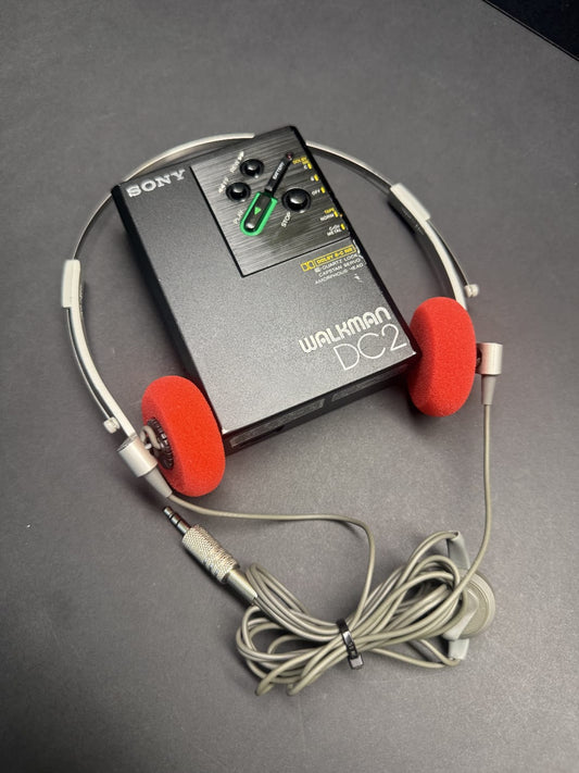 SONY WM-DC2 + SONY MDR 4lS headphones.